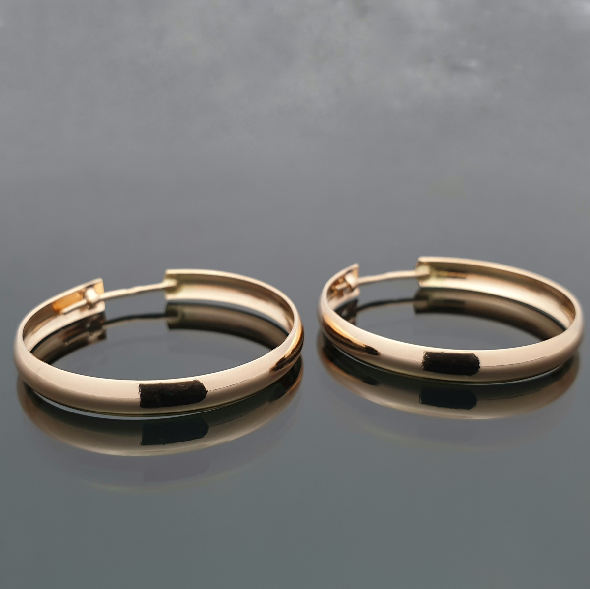  Wider round gold earrings