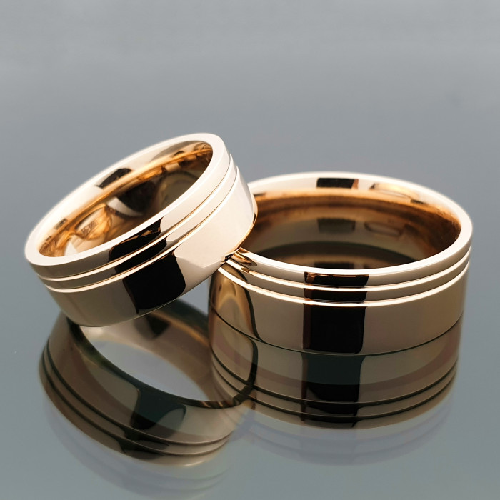 Raudono aukso vestuviniai žiedai dekoruoti juostelėmis (vz86)
