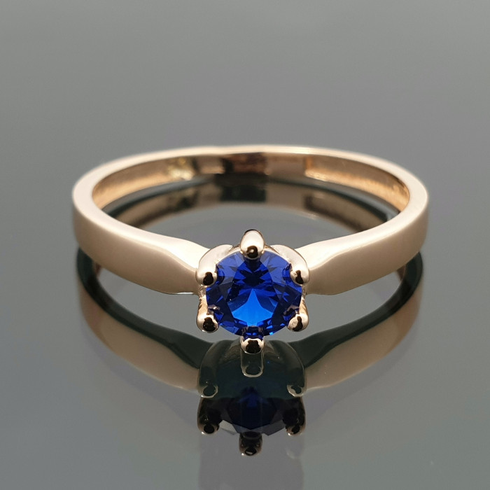 Auksinis žiedas su mėlyna akute (1457)