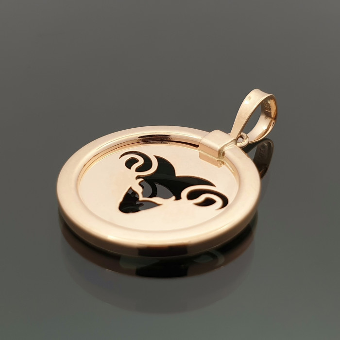 Golden pendant with zodiac sign 