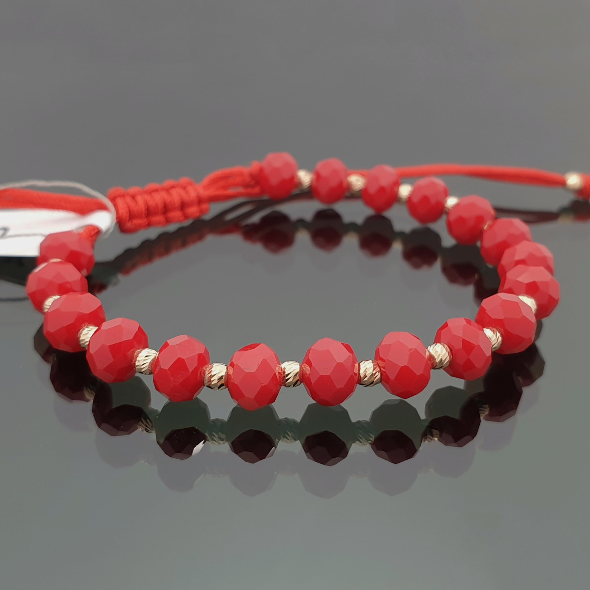 Red bead bracelet with gold details (622) 1