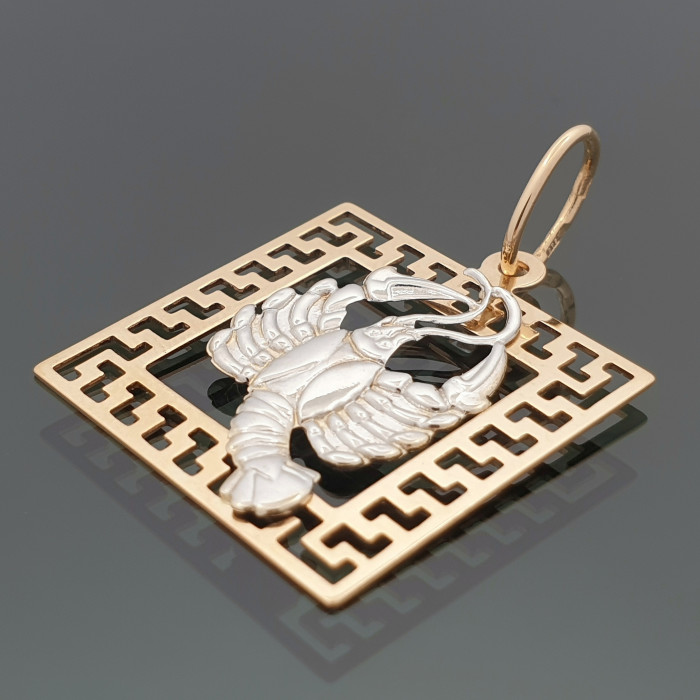 Gold pendant with zodiac sign 