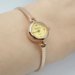 Gold watch (684) 2