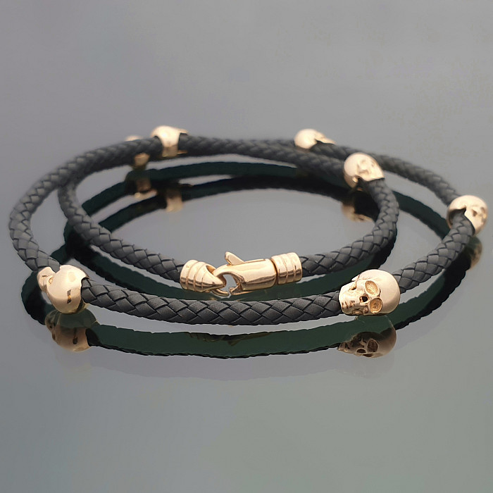 Leather necklace with gold details "Skulls" (1587)