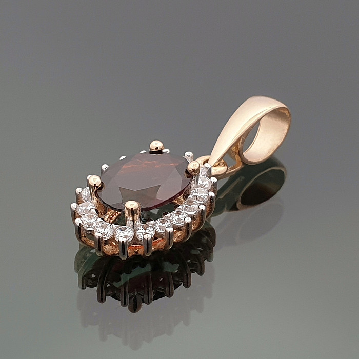 Elegant gold pendant with brown eye (1004)