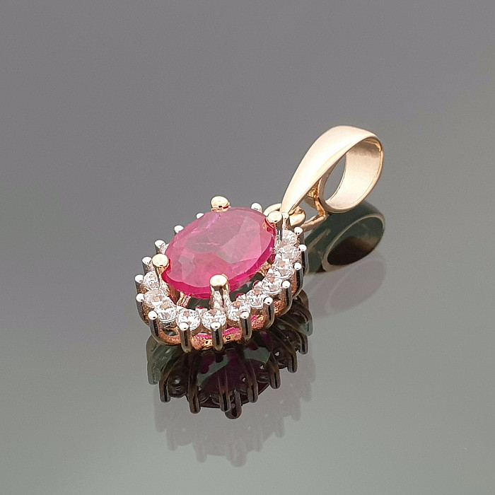 Elegant gold pendant with pink eye (1006)