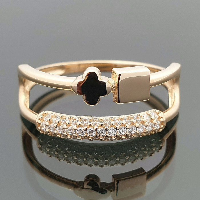 Golden ring with black clover and eyelets (1922)