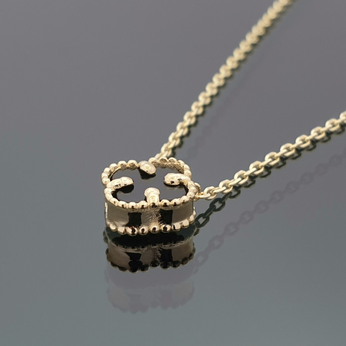 Yellow gold chain with black clover pendant (1619)