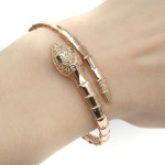 Zelta rokassprādze "Čūska" (732), Cietas aproces, Zelta standarts: 585, Produkta foto svars: 12.89 g, Dārgakmeņi: Cirkonis - Pielāgotas rotājumlietas