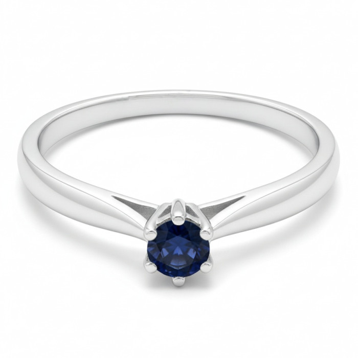 Baltā zelta gredzens ar tumši zilu safīru (375)