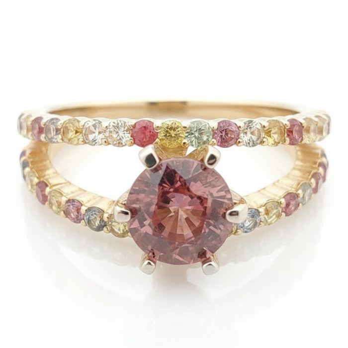  Massive gold ring decorated with zircon and sapphires (902)