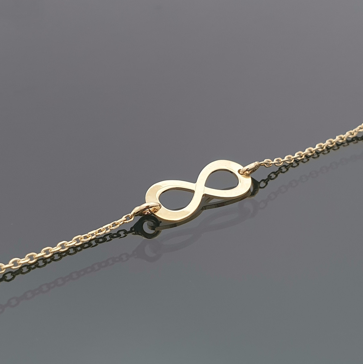 Yellow gold bracelet "Infinity" (506) 1