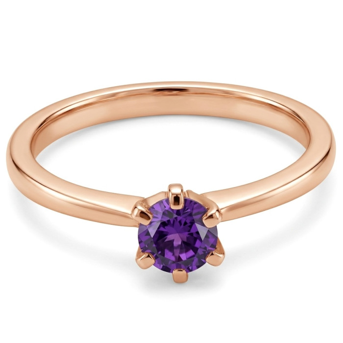  Gold ring with purple zircon hole