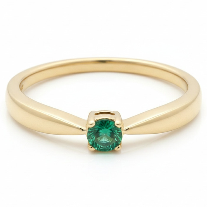  Yellow gold ring decorated with an emerald (1495)