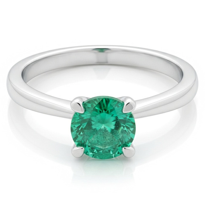  White gold ring decorated with an emerald (1598)