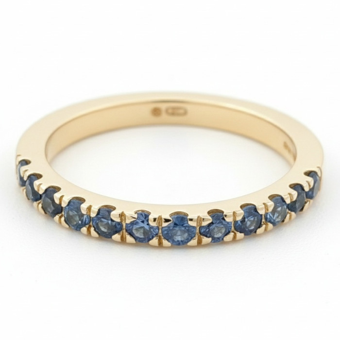  Yellow gold ring decorated with blue sapphires (1706)