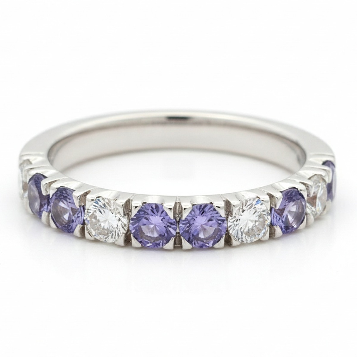  White gold ring decorated with a band of purple and diamonds (1823), Women's Rings, Gold type: 585, Item in the photo weight: 4.47 g, Gemstone: Tanzanite, Gemstone ct.: 0.60 ct, Gemstone ct.: 0.70-1.50 ct,  Weight of extra gems: 0.55 ct - Jewelry online