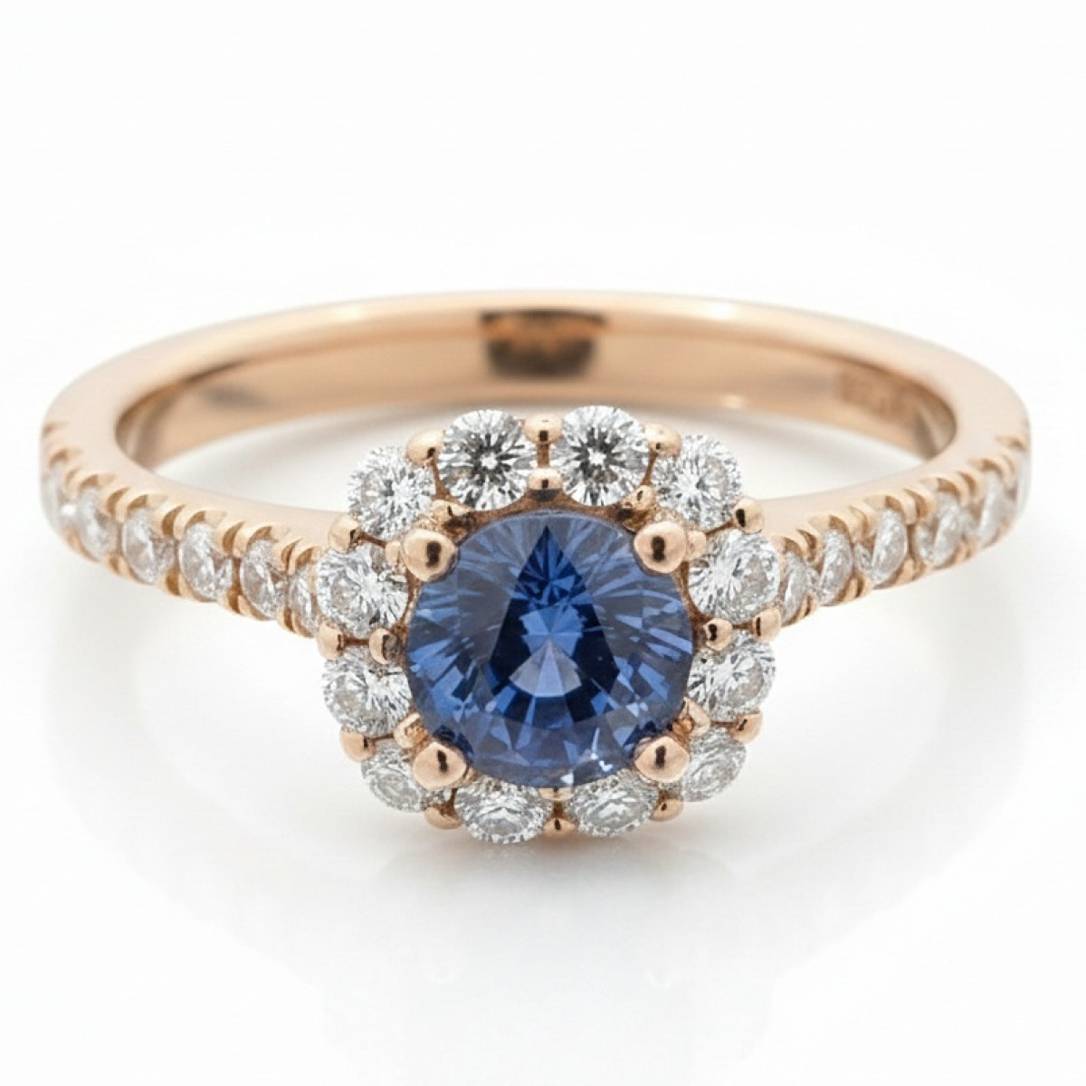Rose Gold Halo Ring with Blue Sapphire and Diamonds (2600), Women's Rings, Gold type: 585, Item in the photo weight: 3.39 g, Gemstone: Sapphire, Gemstone ct.: 0.75 ct, Gemstone ct.: 0.70-1.50 ct,  Weight of extra gems: 0.50 ct - Jewelry online