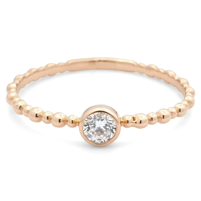 Minimalistinis auksinis žiedas su akute (1993)